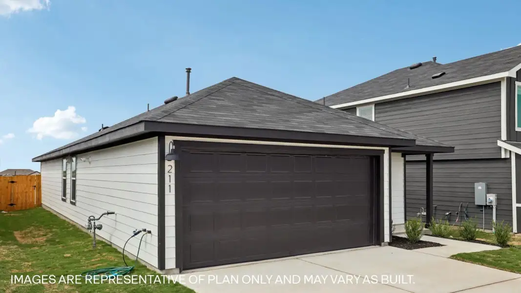 Front exterior of a new home in Marigold, Kyle, TX, highlighting curb appeal (Image 18).