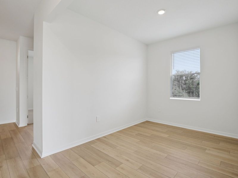 Spacious, unfurnished interior of a new home in Coasterra - Reserve Series, Palmetto (Image 15).