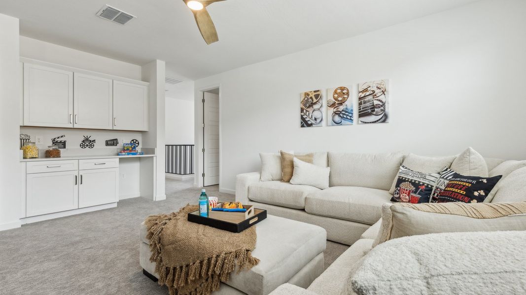 Representative furnished interior of a home built from the Miraval by D.R. Horton in The Ridge at Stone Butte, Phoenix (Image 47).