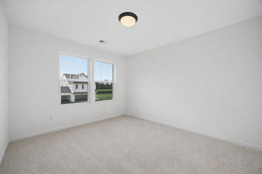 Spacious, unfurnished interior of a new home in Reeves Crossing, St. George (Image 5).