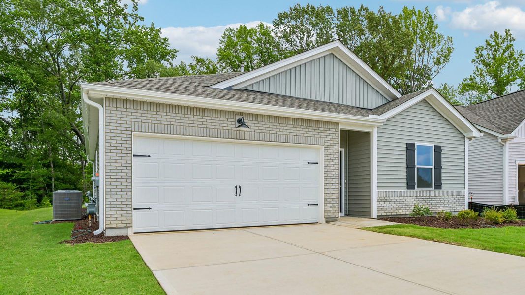 Representative exterior photo of a completed home built from the Freeport by D.R. Horton in The Villas at Laurel Oaks, Sanford, NC (Image 20). Representative exterior photo of a completed home built from the Freeport by D.R. Horton in The Villas at Laurel Oaks, Sanford, NC (Image 20).