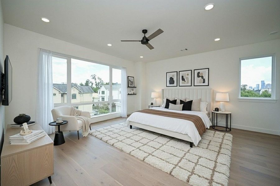 Master Bedroom with Architectural Style Windows, and Unobstructed views of Downtown skyline. Virtually Staged.