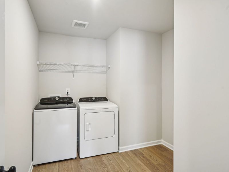 The Taylorsville floorplan with the Divine White interior package.