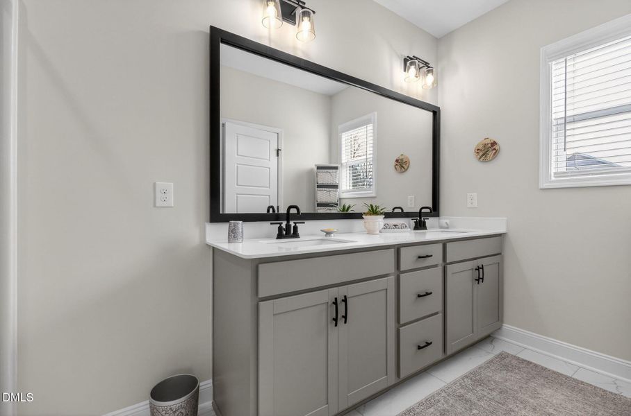 Dual sink vanity with quartz countertops