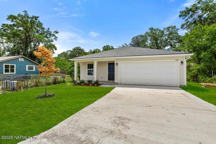 Front exterior of a new home in , Jacksonville, FL, highlighting curb appeal (Image 27). Front exterior of a new home in , Jacksonville, FL, highlighting curb appeal (Image 27).