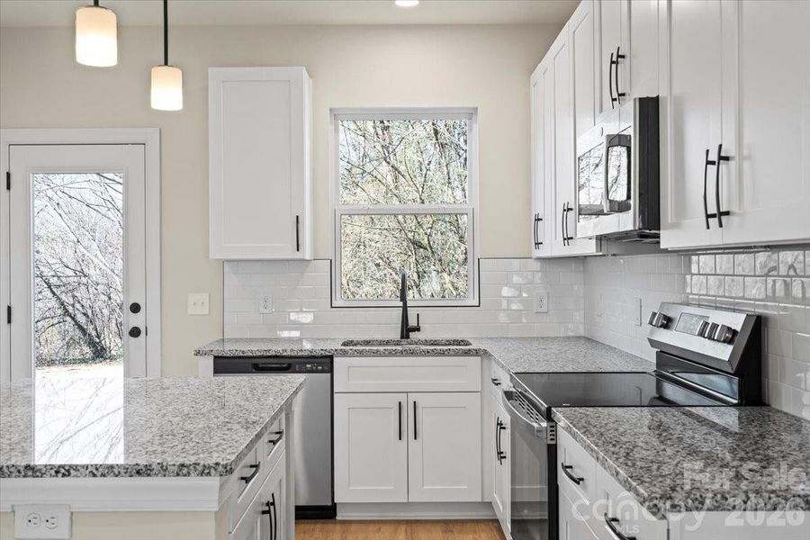 Furnished interior view inside a new home in , Hickory (Image 4).