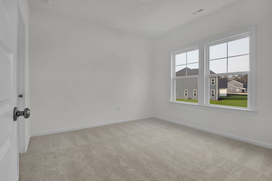 Spacious, unfurnished interior of a new home in Indigo at Abbey Preserve, Wilmington (Image 32).