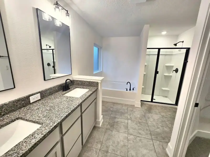 Furnished interior view inside a new home in Harmony Central, Harmony (Image 6).
