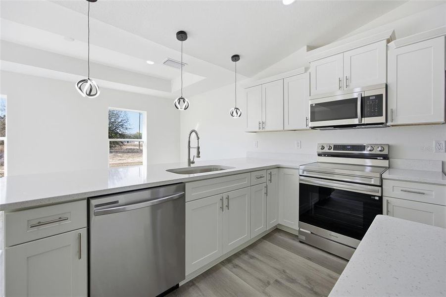 Furnished interior view inside a new home in , Dunnellon (Image 6).