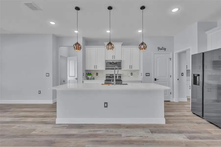 Furnished interior view inside a new home in , Poinciana (Image 9).