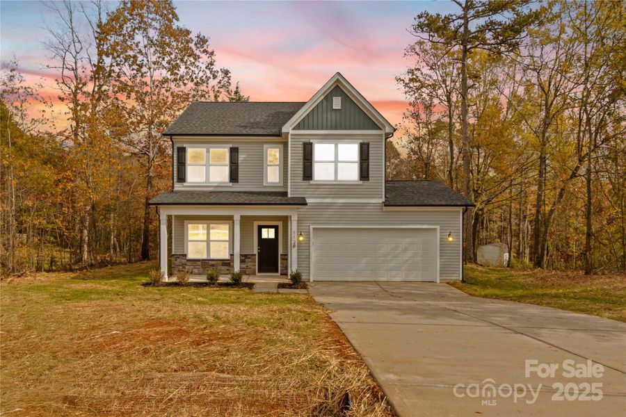 Front exterior of a new home in , Statesville, NC, highlighting curb appeal (Image 26).