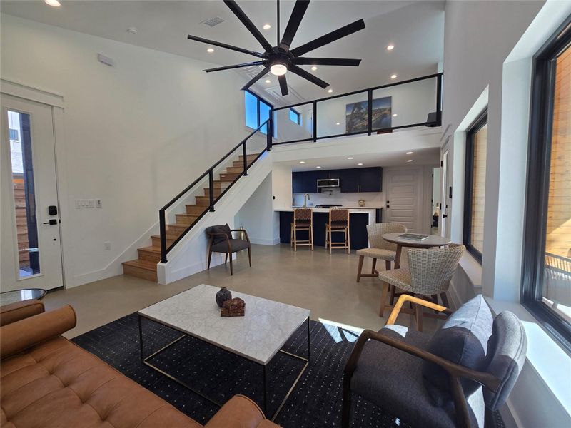 Glass panel staircase allows you to blend the mezzanine and main levels easily. Glass panel staircase allows you to blend the mezzanine and main levels easily.