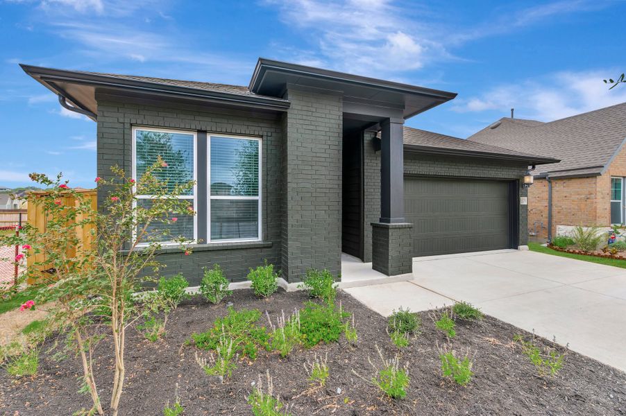 Exterior details and patio area of a home in Briggs Ranch – Select Classic Series, San Antonio (Image 4).