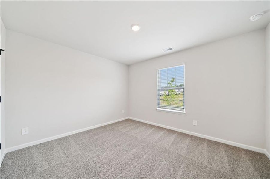 Spacious, unfurnished interior of a new home in Vines at Mill Creek - Estate Series, Braselton (Image 29).