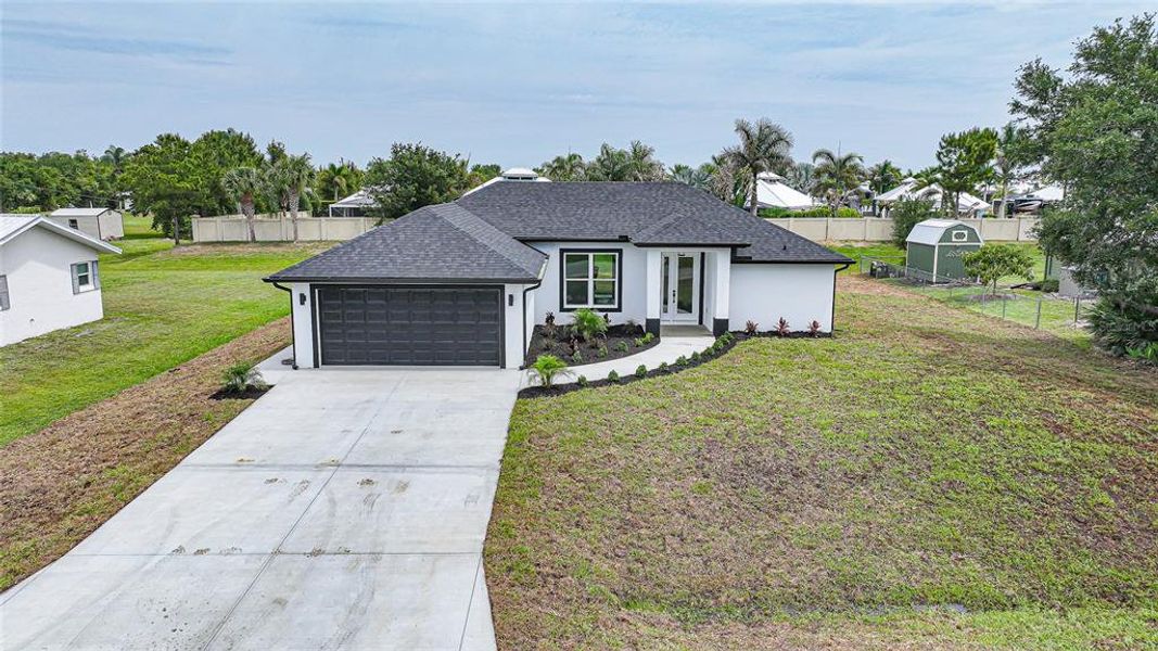 Front exterior of a new home in , Arcadia, FL, highlighting curb appeal (Image 24).