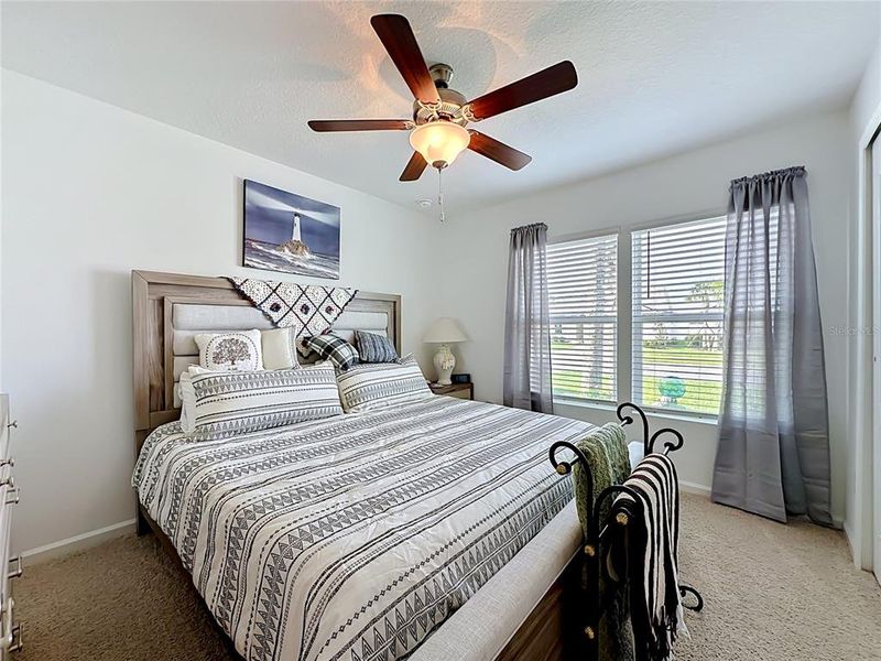 Furnished interior view inside a new home in Sawmill Branch Express, Palm Coast (Image 19).