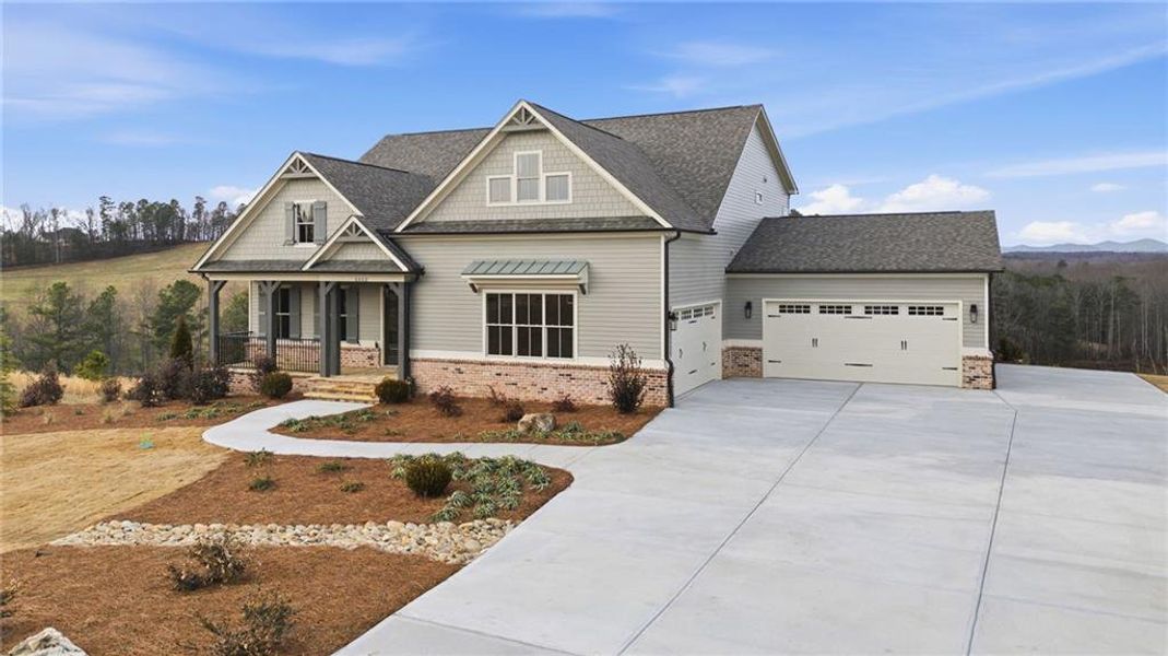 Front exterior of a new home in , Gainesville, GA, highlighting curb appeal (Image 1). Front exterior of a new home in , Gainesville, GA, highlighting curb appeal (Image 1).