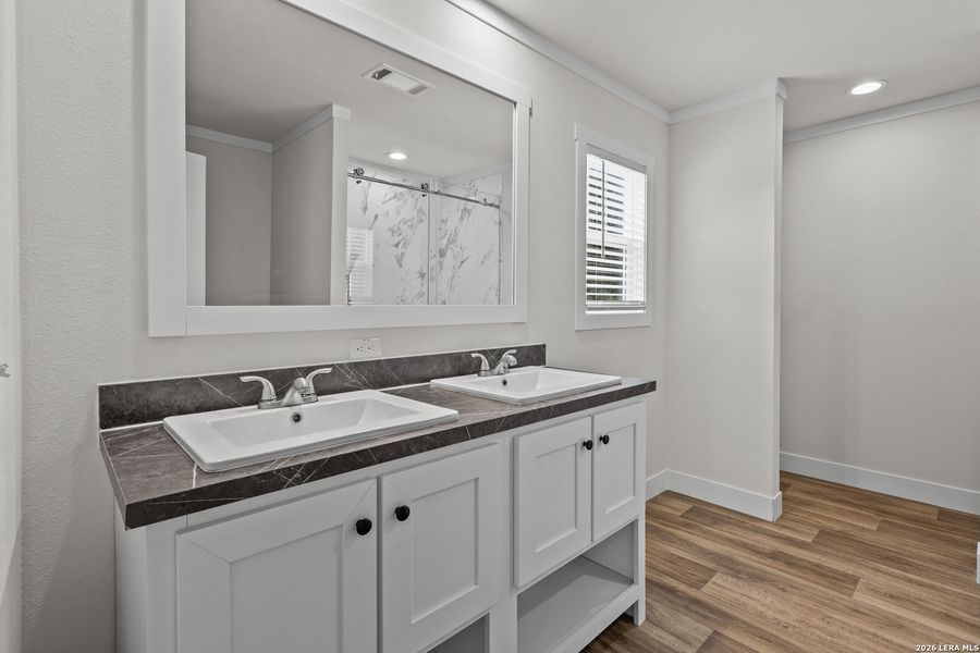 Furnished interior view inside a new home in , Devine (Image 9).