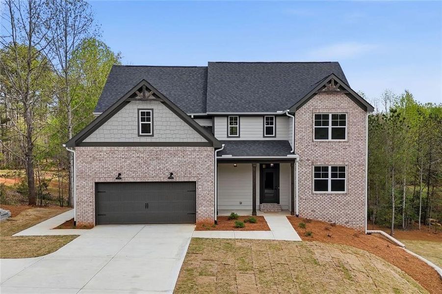 Front exterior of a new home in , Dawsonville, GA, highlighting curb appeal (Image 1). Front exterior of a new home in , Dawsonville, GA, highlighting curb appeal (Image 1).