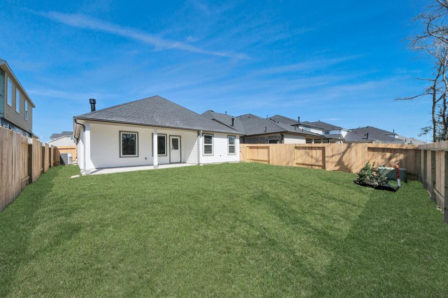 Explore the expansive backyard with its inviting covered patio—a perfect blend of space for the kids to play and adults to unwind. Ideal for creating your outdoor oasis, this backyard accommodates patio furniture, a BBQ pit, and endless possibilities for leisure and entertainment.