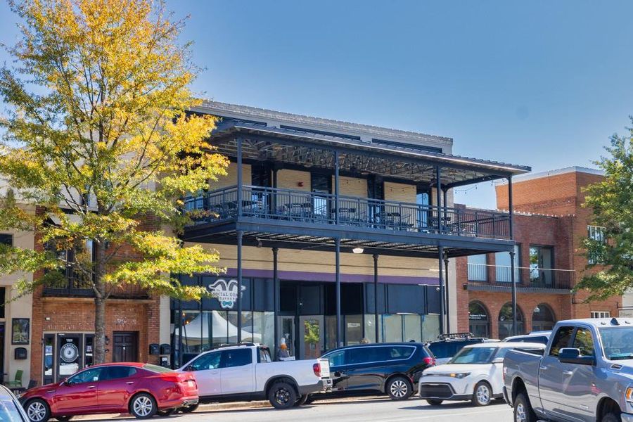 Front exterior of a new home in Pinegate, Covington, GA, highlighting curb appeal (Image 16). Front exterior of a new home in Pinegate, Covington, GA, highlighting curb appeal (Image 16).