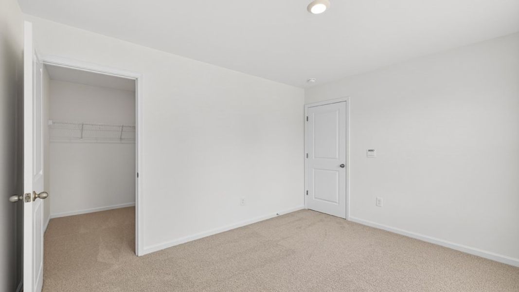 Representative unfurnished interior of a home built from the Alec by D.R. Horton in Madden West, Fuquay Varina (Image 21).