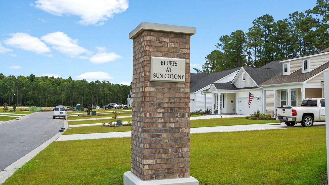 Front exterior of a new home in Bluffs at Sun Colony, Longs, SC, highlighting curb appeal (Image 20).