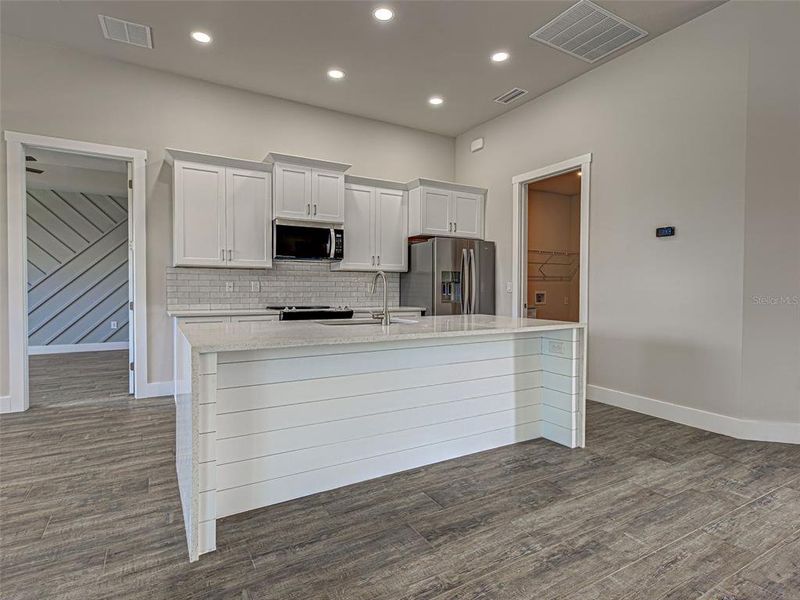 Furnished interior view inside a new home in , Port Charlotte (Image 13).