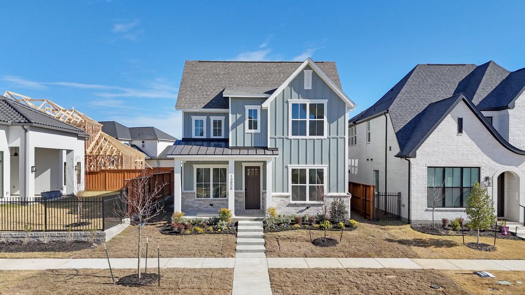 Front exterior of a new home in Fields - 40' Lots, Frisco, TX, highlighting curb appeal (Image 25). Front exterior of a new home in Fields - 40' Lots, Frisco, TX, highlighting curb appeal (Image 25).
