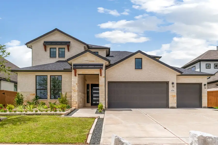 Front exterior of a new home in The Retreat at Norman Farm, Hendersonville, TN, highlighting curb appeal (Image 2).