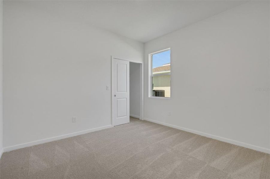 Spacious, unfurnished interior of a new home in Brystol North at Wylder, Port St. Lucie (Image 14).