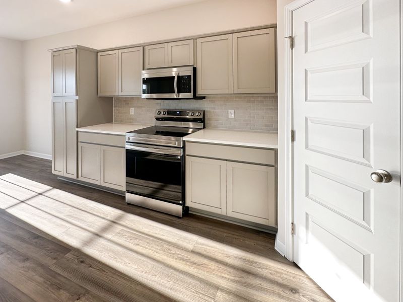 Furnished interior view inside a new home in The Village at Sassafras, Allenhurst (Image 7).