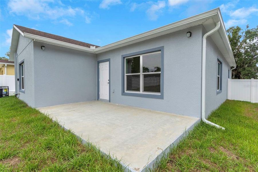 Front exterior of a new home in , Tampa, FL, highlighting curb appeal (Image 25).
