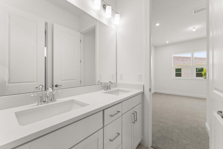 Furnished interior view inside a new home in Tradition - Seville, Port St. Lucie (Image 2).