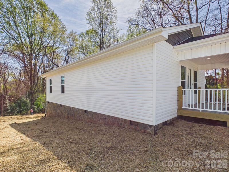 Exterior details and patio area of a home in , Valdese (Image 21).
