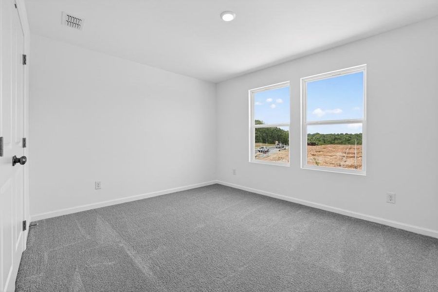 Spacious, unfurnished interior of a new home in Weatherfield, Buford (Image 30).