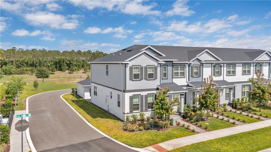 Front exterior of a new home in , Winter Garden, FL, highlighting curb appeal (Image 22).