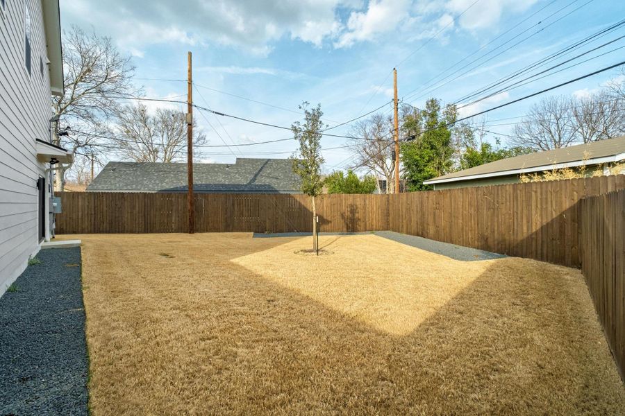 View of fenced backyard