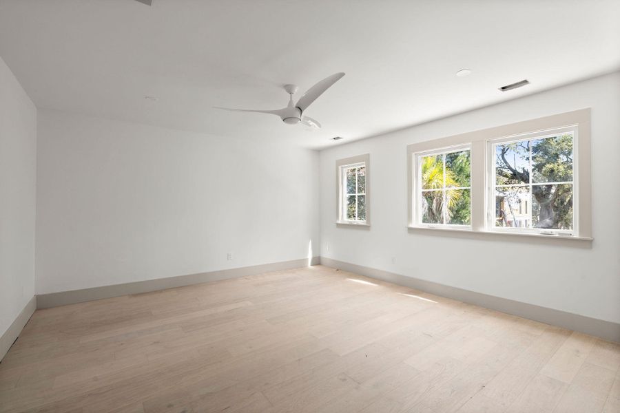 Spacious, unfurnished interior of a new home in , Isle Of Palms (Image 14).