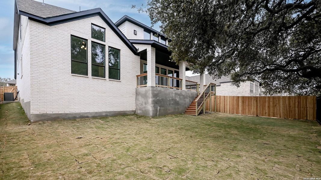 Exterior details and patio area of a home in Johnson Ranch, Bulverde (Image 4).