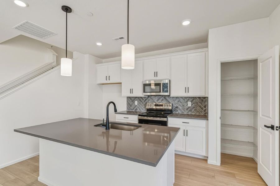 Furnished interior view inside a new home in Turnberry Villas, Commerce City (Image 4).