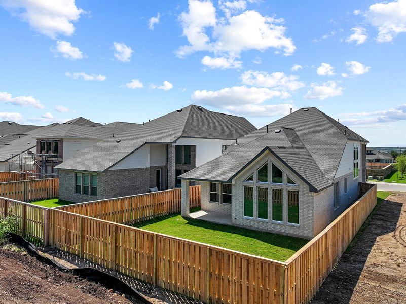Exterior details and patio area of a home in Parmer Ranch, Georgetown (Image 25).