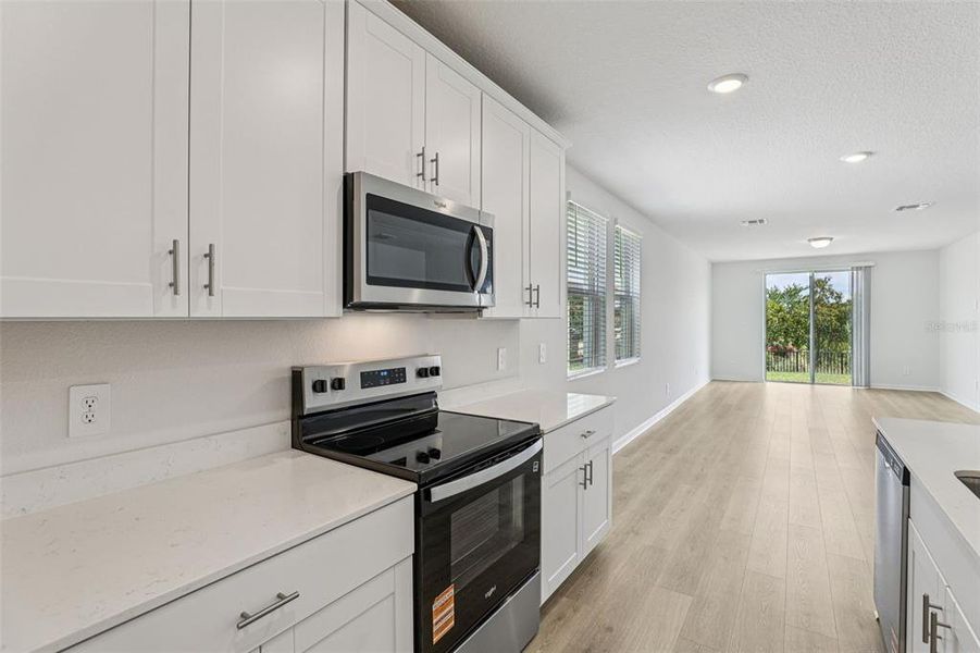 Furnished interior view inside a new home in Crosswinds - Signature Series, Haines City (Image 6).