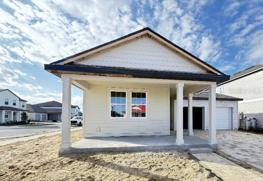 Exterior details and patio area of a home in Trailside, Mount Dora (Image 3). Exterior details and patio area of a home in Trailside, Mount Dora (Image 3).