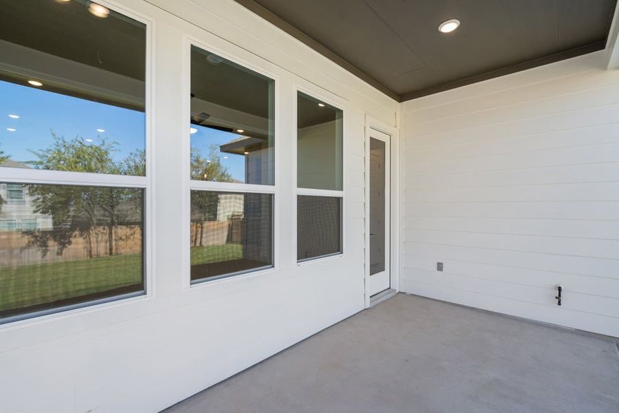 Exterior details and patio area of a home in Arbor Collection At Park Central, Georgetown (Image 26).