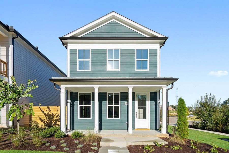 Front exterior of a new home in Harmony, Auburn, GA, highlighting curb appeal (Image 1).