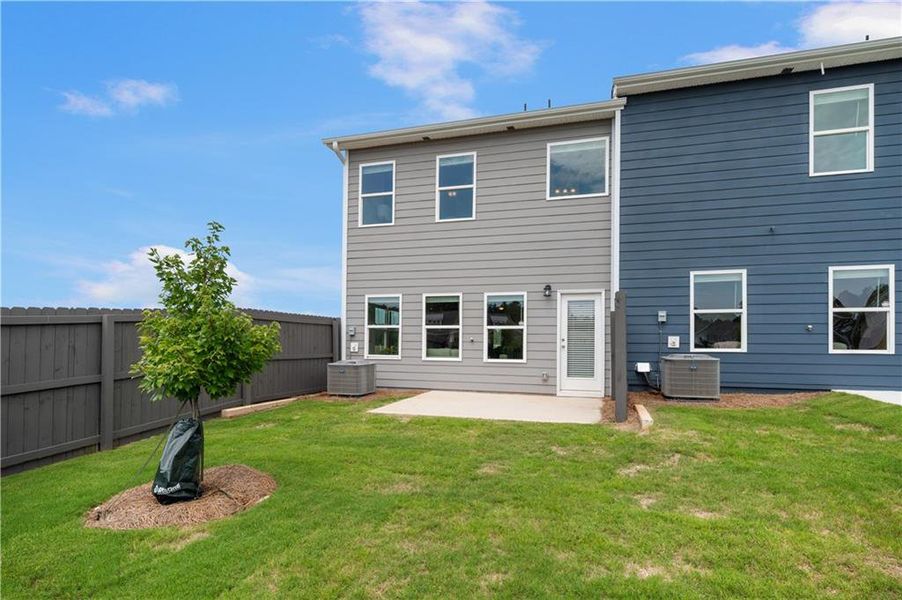 Exterior details and patio area of a home in Walden Park – The Collection, Jonesboro (Image 26).