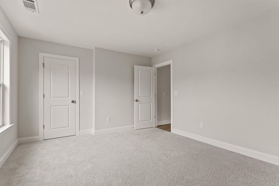 Spacious, unfurnished interior of a new home in Sweetgrass Station, Summerville (Image 34).