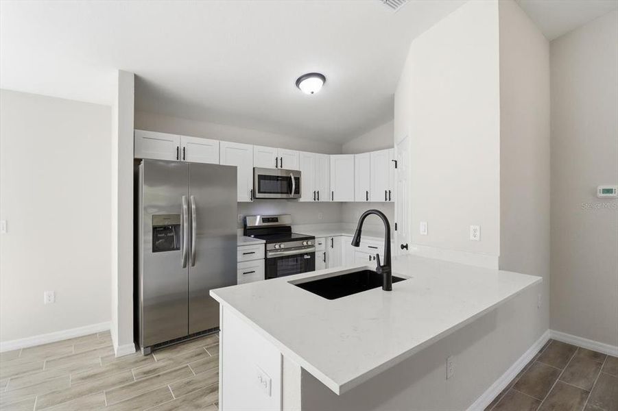 Furnished interior view inside a new home in , Ocala (Image 5).
