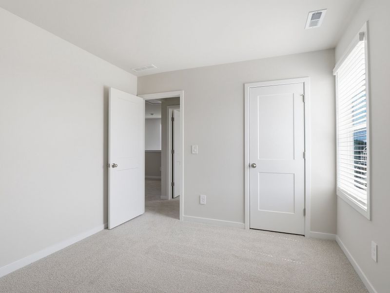 Spacious, unfurnished interior of a new home in Country Lane - Classic Series, Clayton (Image 18).